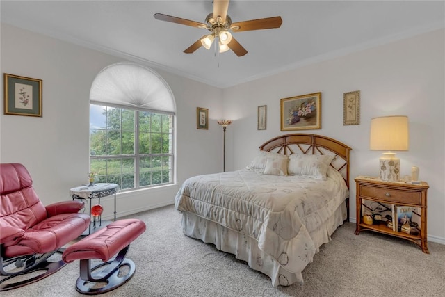 201 Lasso, Horseshoe Bay, TX 78657 - bedroom with carpet, ornamental molding, and ceiling fan