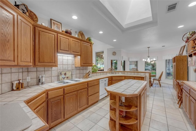 201 Lasso, Horseshoe Bay, TX 78657 - kitchen featuring tile countertops, a peninsula, white appliances, tasteful backsplash, and open shelves