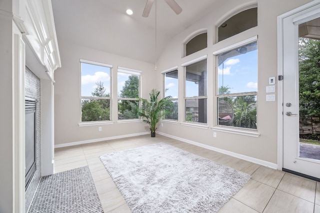 14320 Senia Bnd, Austin, TX 78738 - interior space with tile patterned flooring, vaulted ceiling, and baseboards