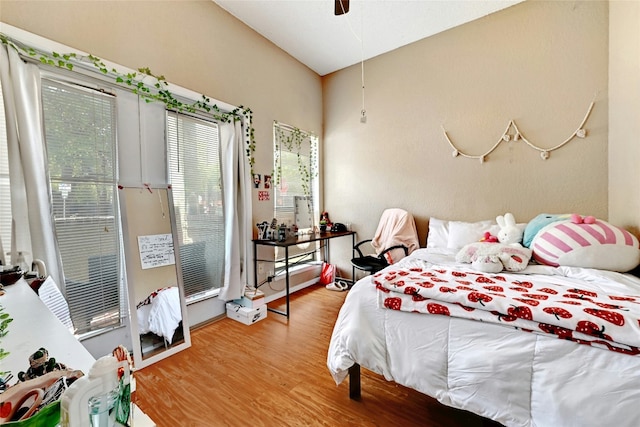 bedroom featuring wood finished floors and ceiling fan