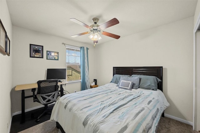 9209 Sweetgum Dr Unit 153, Austin, TX 78748 - carpeted bedroom with baseboards, a ceiling fan, and a desk