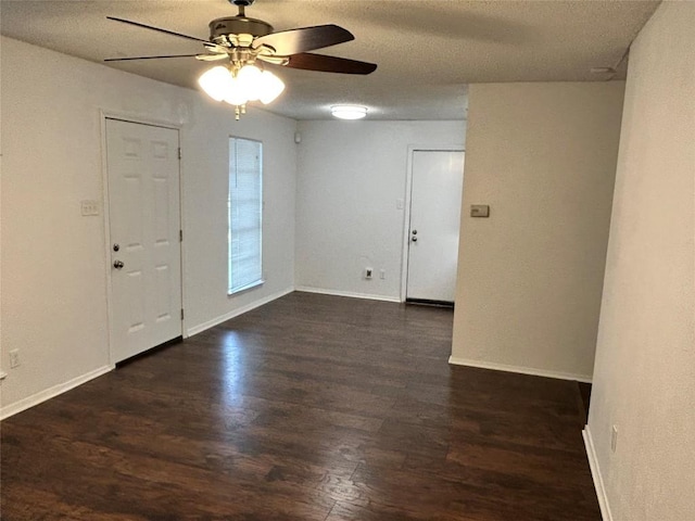 6705 Skynook Dr, Austin, TX 78745 - empty room featuring ceiling fan, wood finished floors, and a textured ceiling