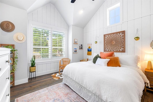 bedroom featuring lofted ceiling, wood finished floors, and a ceiling fan