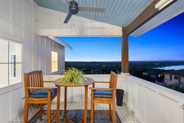 balcony featuring ceiling fan