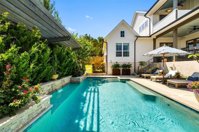 view of swimming pool featuring a fenced in pool, an outdoor hangout area, a patio, and fence