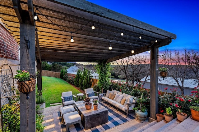 patio terrace at dusk with an outdoor living space, a lawn, a fenced backyard, and a pergola