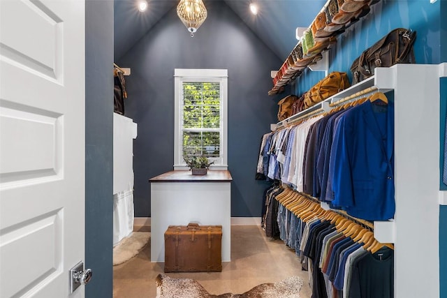 spacious closet featuring lofted ceiling