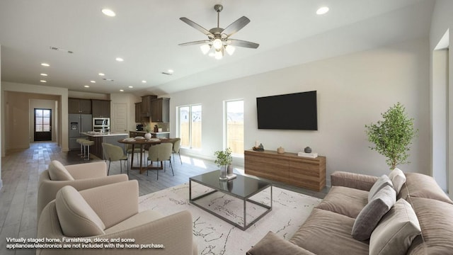 163 Plumbago Loop, Bastrop, TX 78602 - living area featuring recessed lighting, ceiling fan, light wood finished floors, and baseboards
