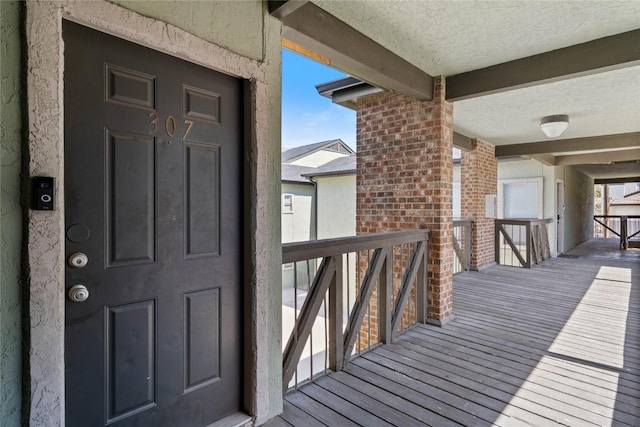 807 W 25th St Unit 307, Austin, TX 78705 - entrance to property with brick siding and a balcony