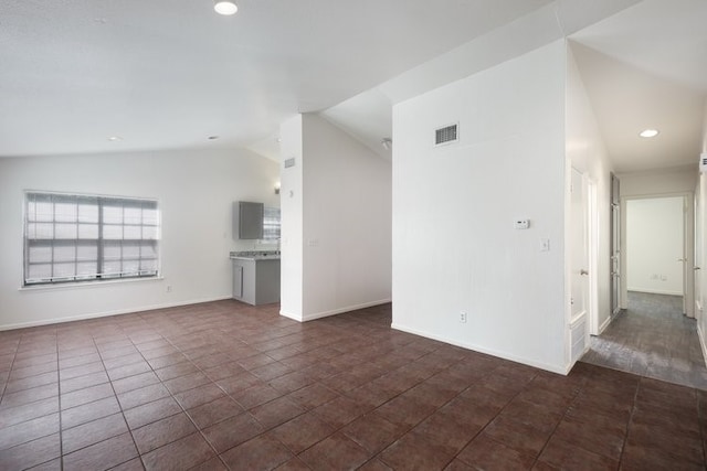 1102-1104-1106 Academy St, San Marcos, TX 78666 - unfurnished living room featuring recessed lighting, baseboards, and lofted ceiling