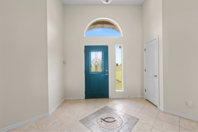 341 Brown Rd, Mcdade, TX 78650 - tiled entryway with a high ceiling and baseboards