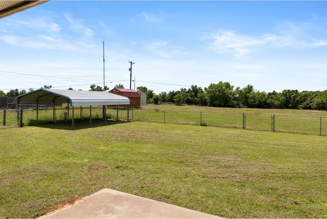 341 Brown Rd, Mcdade, TX 78650 - view of yard with a rural view, a carport, and fence