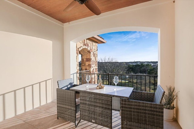 balcony featuring a ceiling fan