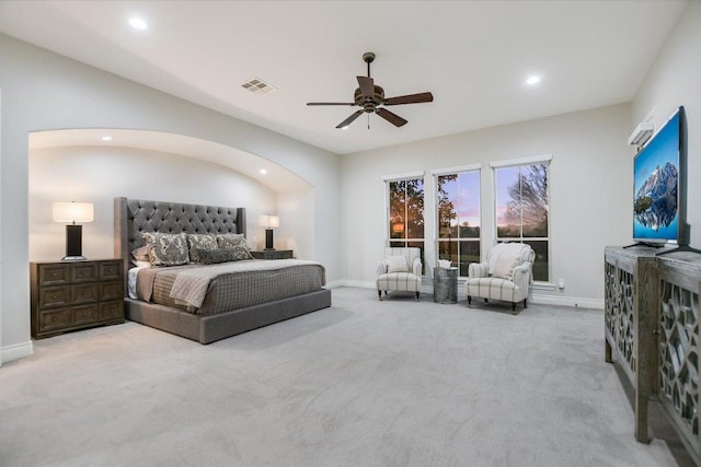 bedroom with arched walkways, carpet flooring, recessed lighting, and baseboards