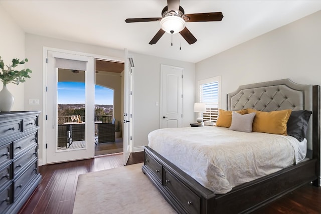 bedroom featuring dark wood finished floors, access to exterior, a ceiling fan, and baseboards