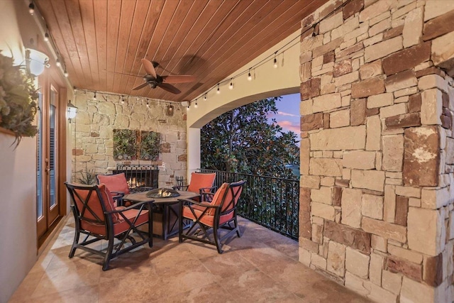 211 Jack Nicklaus Dr, Austin, TX 78738 - view of patio / terrace featuring a ceiling fan and a fire pit