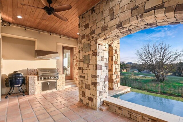 211 Jack Nicklaus Dr, Austin, TX 78738 - view of patio / terrace with an outdoor kitchen and a ceiling fan