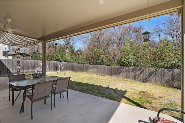 view of patio featuring outdoor dining space and a fenced backyard