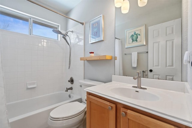 bathroom with toilet, shower / bath combo, and vanity