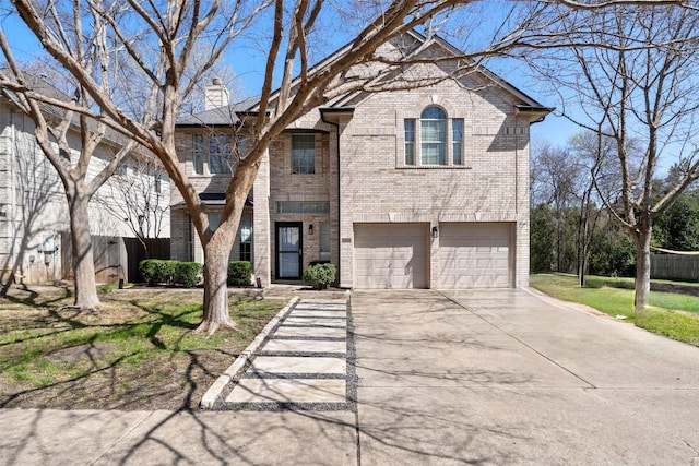 view of front of home with fence, driveway, an attached garage, a front lawn, and brick siding