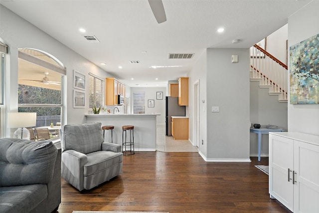 13605 Campesina Dr, Austin, TX 78727 - living area featuring a ceiling fan, wood-type flooring, recessed lighting, stairs, and baseboards
