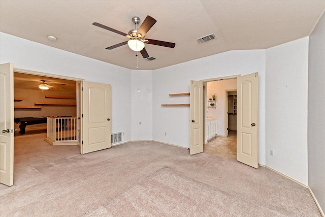 4437 Chickasaw Ct, Austin, TX 78749 - unfurnished bedroom featuring light colored carpet and a ceiling fan