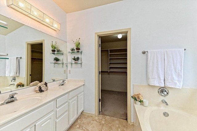 4437 Chickasaw Ct, Austin, TX 78749 - full bathroom with double vanity, a bath, and a walk in closet