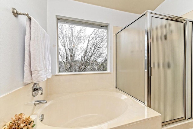 4437 Chickasaw Ct, Austin, TX 78749 - full bathroom featuring a shower stall and a garden tub
