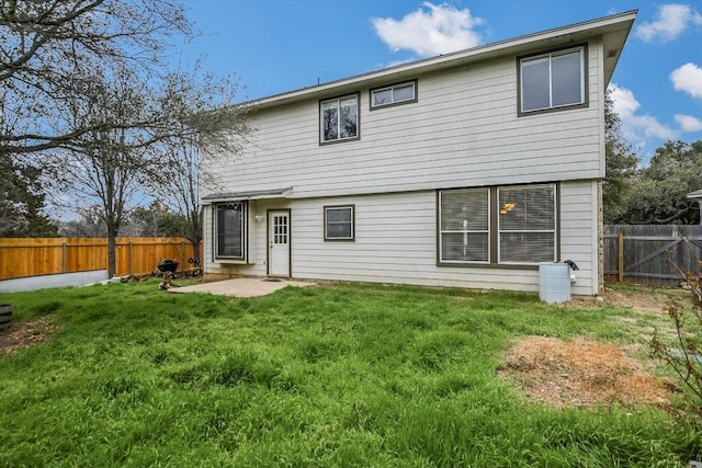 4437 Chickasaw Ct, Austin, TX 78749 - rear view of house with a fenced backyard and a patio area
