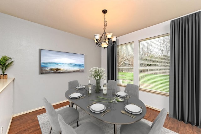 4437 Chickasaw Ct, Austin, TX 78749 - dining room with a chandelier and wood finished floors