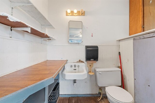 631 S Harris St, Giddings, TX 78942 - half bath featuring a sink and toilet