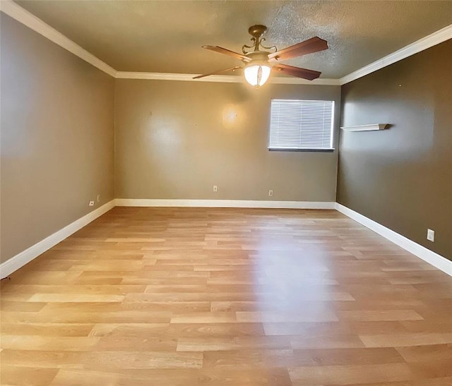 8602 Colonial Dr, Austin, TX 78758 - spare room with a ceiling fan, crown molding, and light wood finished floors