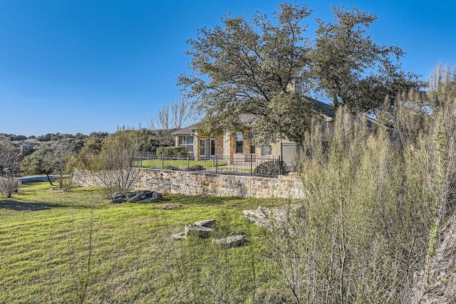 view of yard featuring fence