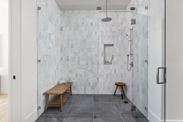 6102 Forest Hills Dr, Austin, TX 78746 - full bath with a shower stall, tile patterned floors, and tile walls