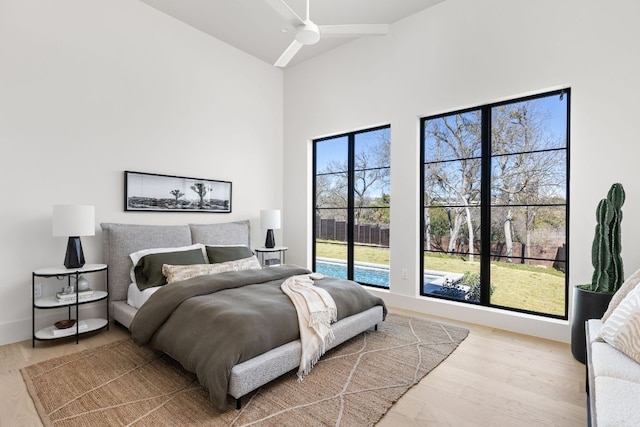6102 Forest Hills Dr, Austin, TX 78746 - bedroom with wood finished floors and a high ceiling