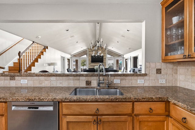 6702 Elfland Dr, Austin, TX 78746 - kitchen featuring stainless steel dishwasher, lofted ceiling, open floor plan, a chandelier, and glass insert cabinets