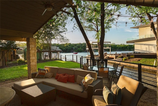 6702 Elfland Dr, Austin, TX 78746 - view of patio featuring a ceiling fan, a water view, outdoor lounge area, and outdoor dining space