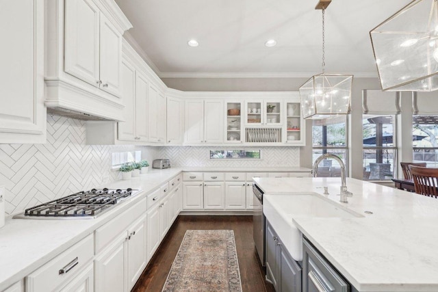 kitchen featuring white cabinetry, a sink, and stainless steel appliances