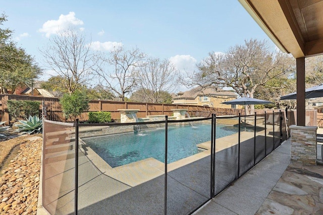 view of pool with a patio area, a fenced in pool, and a fenced backyard