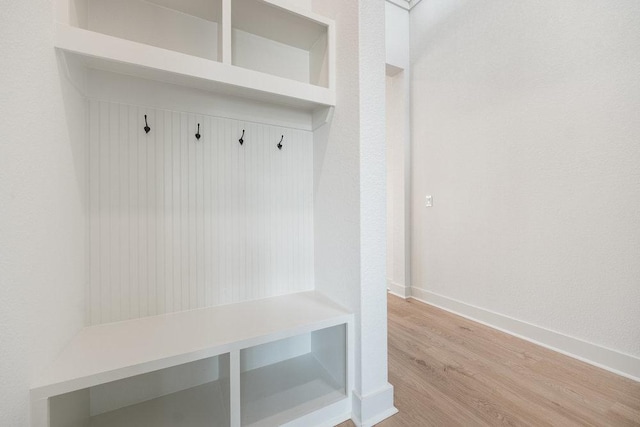 1601 Cardinal Ln, Round Rock, TX 78681 - mudroom with light wood-type flooring and baseboards