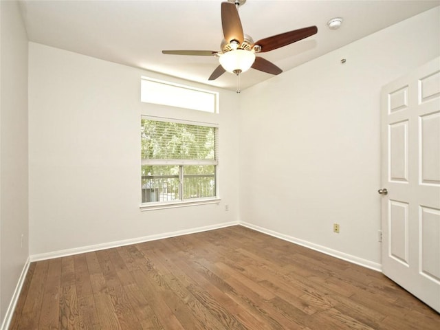 2209 Hancock Dr Unit 4, Austin, TX 78756 - empty room featuring ceiling fan, wood finished floors, baseboards, and a smoke detector