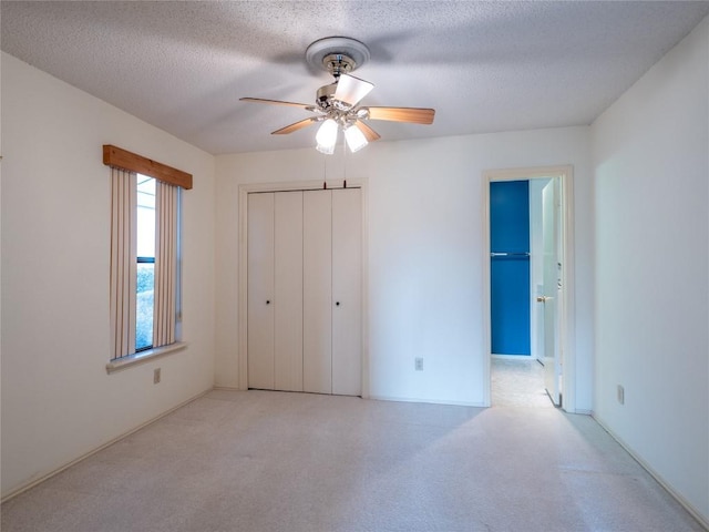 3379 S El Dorado, Lakeway, TX 78734 - unfurnished bedroom featuring a textured ceiling, carpet, a closet, a ceiling fan, and ensuite bathroom