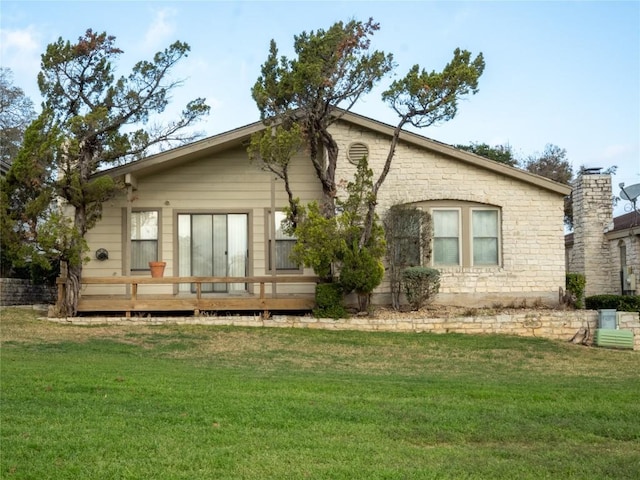 3379 S El Dorado, Lakeway, TX 78734 - back of property featuring a wooden deck, a yard, and a chimney