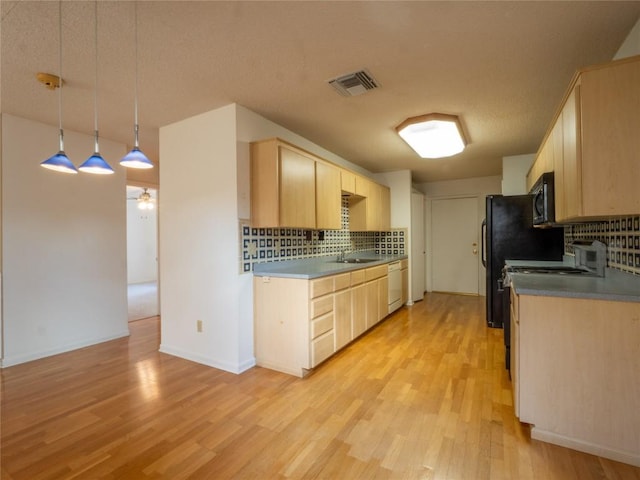 3379 S El Dorado, Lakeway, TX 78734 - kitchen with light brown cabinets, white dishwasher, backsplash, and black microwave