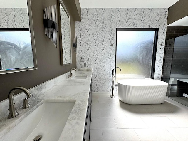 705 E 50th St, Austin, TX 78751 - bathroom featuring a sink and wallpapered walls