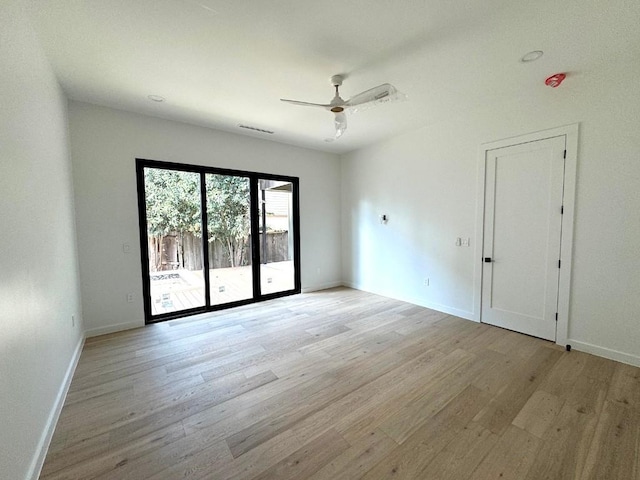 705 E 50th St, Austin, TX 78751 - unfurnished room featuring visible vents, light wood-style flooring, baseboards, and ceiling fan