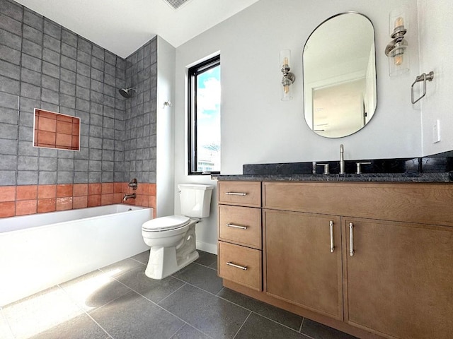705 E 50th St, Austin, TX 78751 - bathroom with tile patterned flooring, toilet, vanity, and bathing tub / shower combination