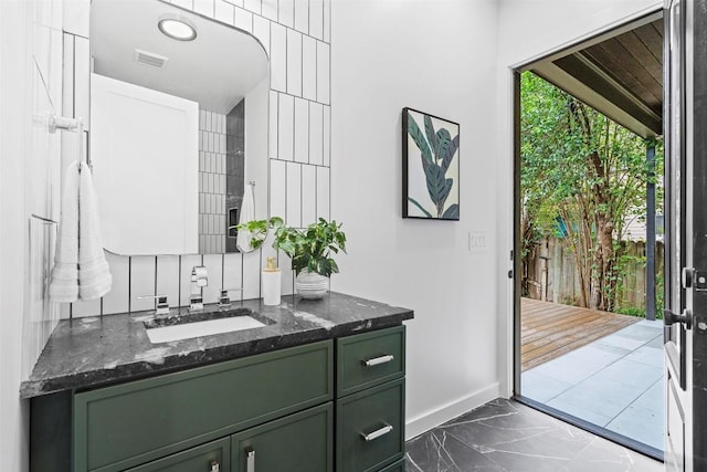 705 E 50th St, Austin, TX 78751 - bathroom with marble finish floors and vanity