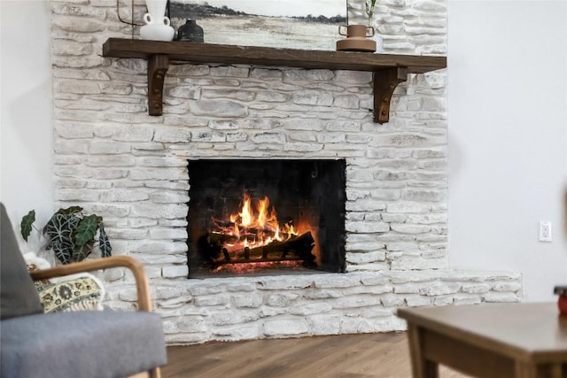 11704 Indianhead Dr, Austin, TX 78753 - detailed view of wood finished floors and a fireplace