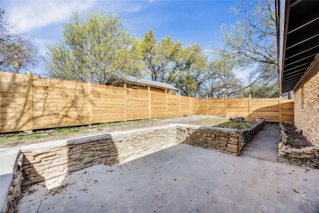 11704 Indianhead Dr, Austin, TX 78753 - fenced backyard with a patio